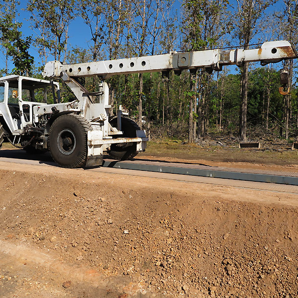 Redeployable workshop with pit